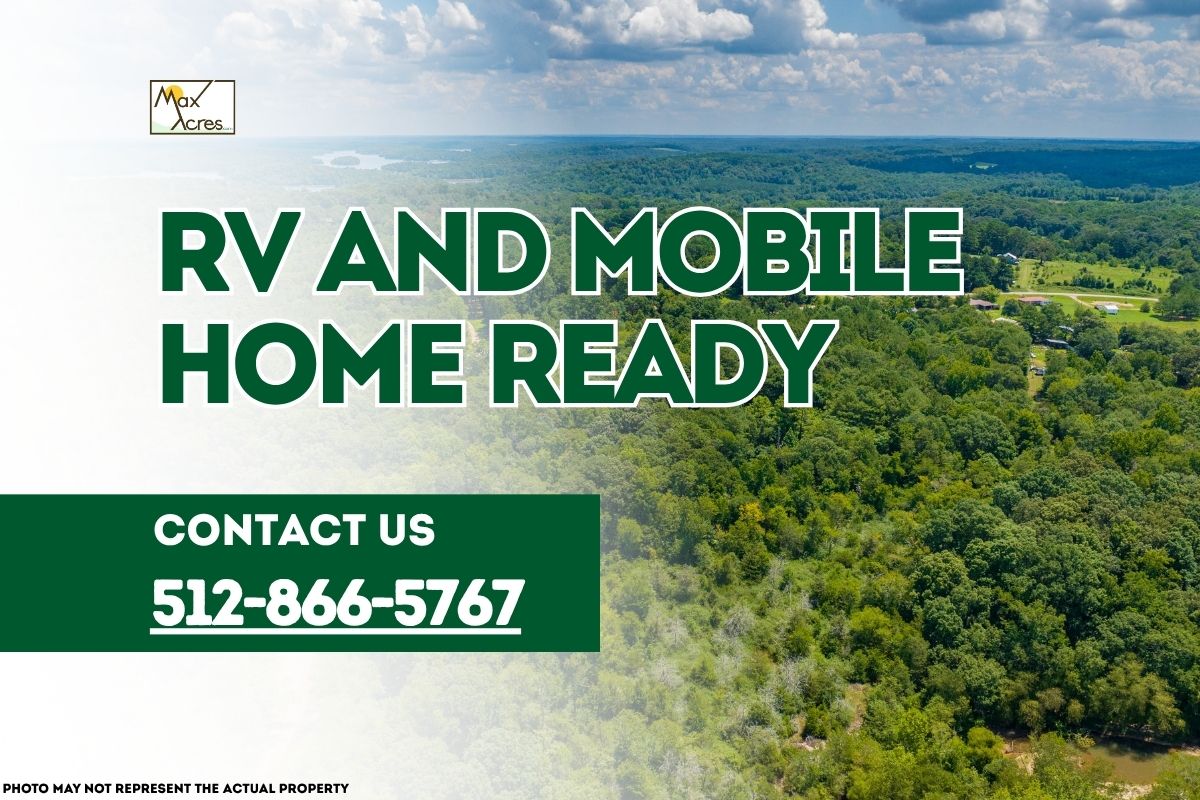 Max Acres banner promoting RV and Mobile Home Ready land for sale with an aerial view of green wooded acreage and clear sky, contact number 512-866-5767