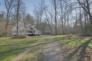 Scenic open acreage in Surry County, Virginia surrounded by trees and country charm — a hidden gem for peaceful living.